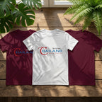 Artistic flat lay of the unisex T-shirt on a wooden surface, highlighting neckline and shoulder details.